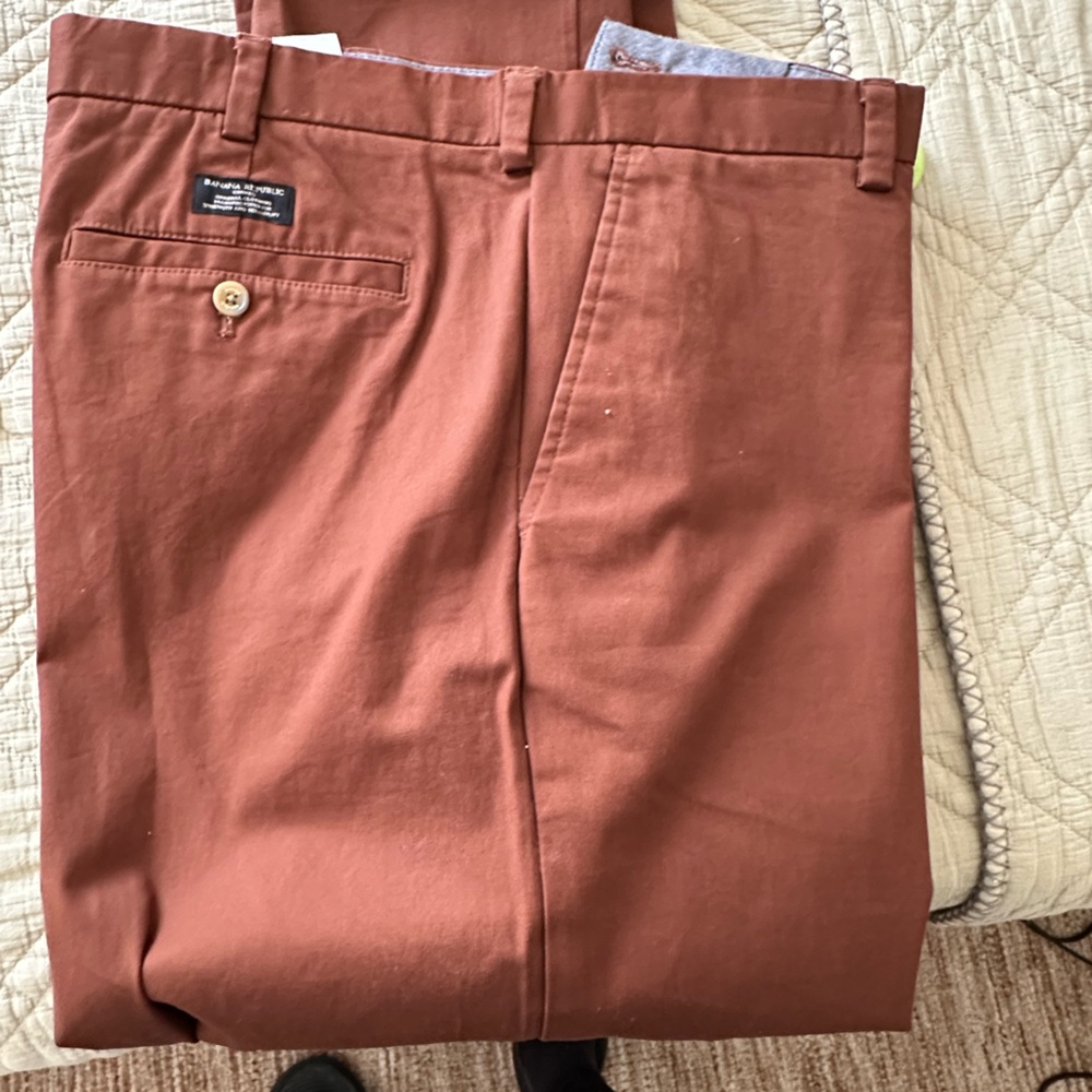 Four pair of Banana Republic chinos rust, blue, brown and gray $25 each